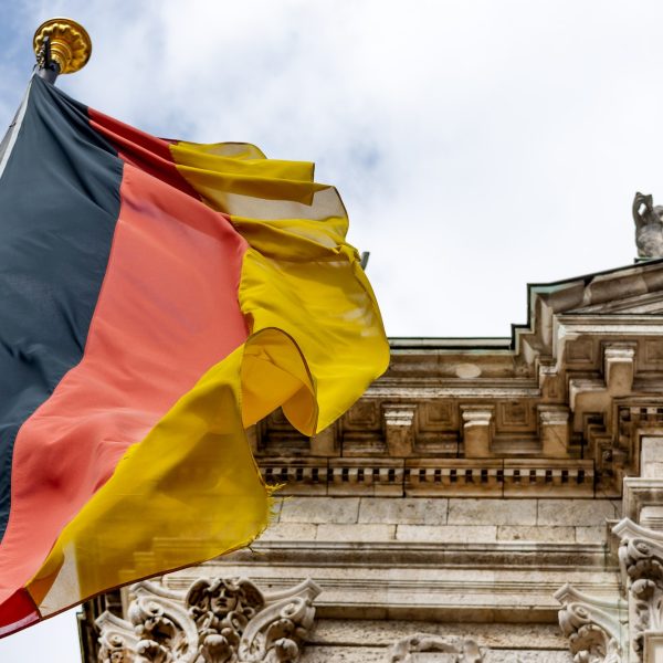 German flag waving in front of the building in Munich, Germany